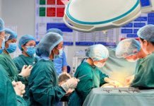 Students observing live surgical procedures performed by expert surgeons at Tan Tao University Hospital